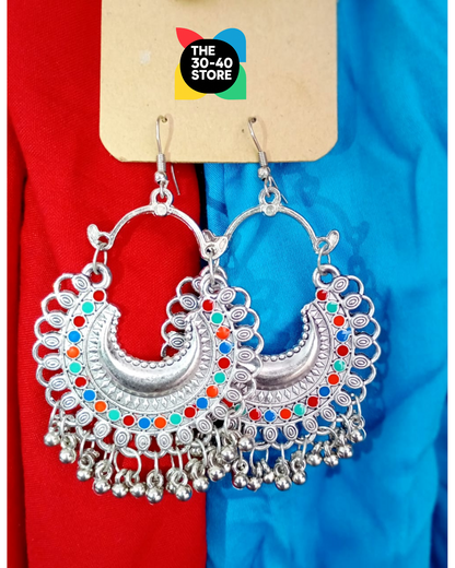 Silver earrings with colorful stones on a red and blue background, branded 'The 30-40 Store'.